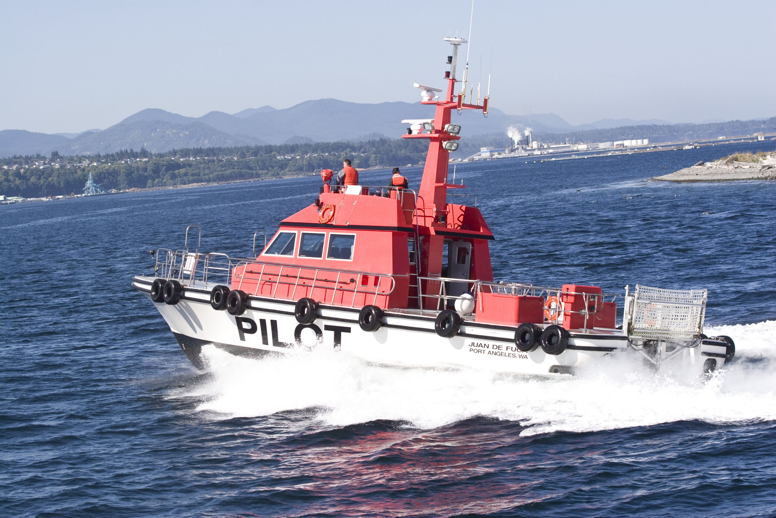 Harbor pilot boat running offshore